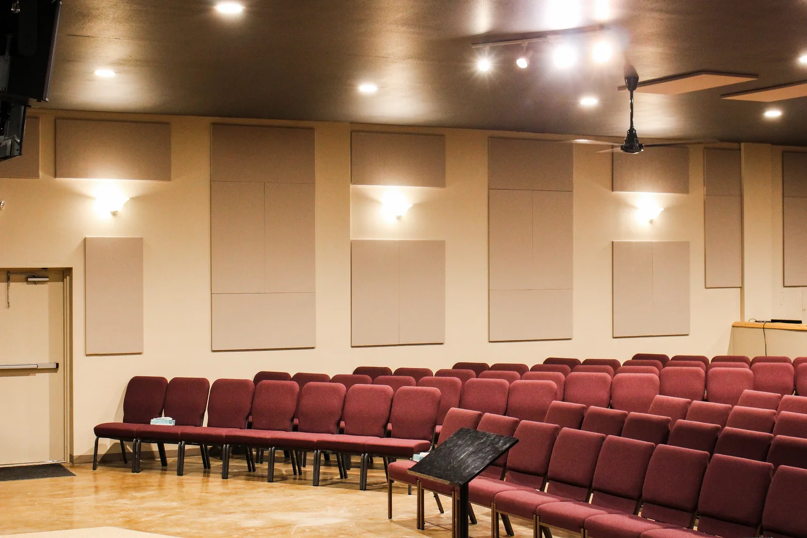 Acoustic wall panels and sconce lighting